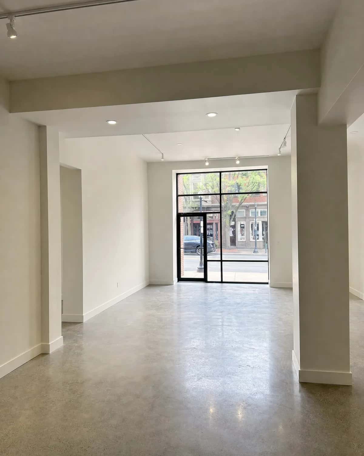 Freshly repainted retail storefront interior ready for display fixtures