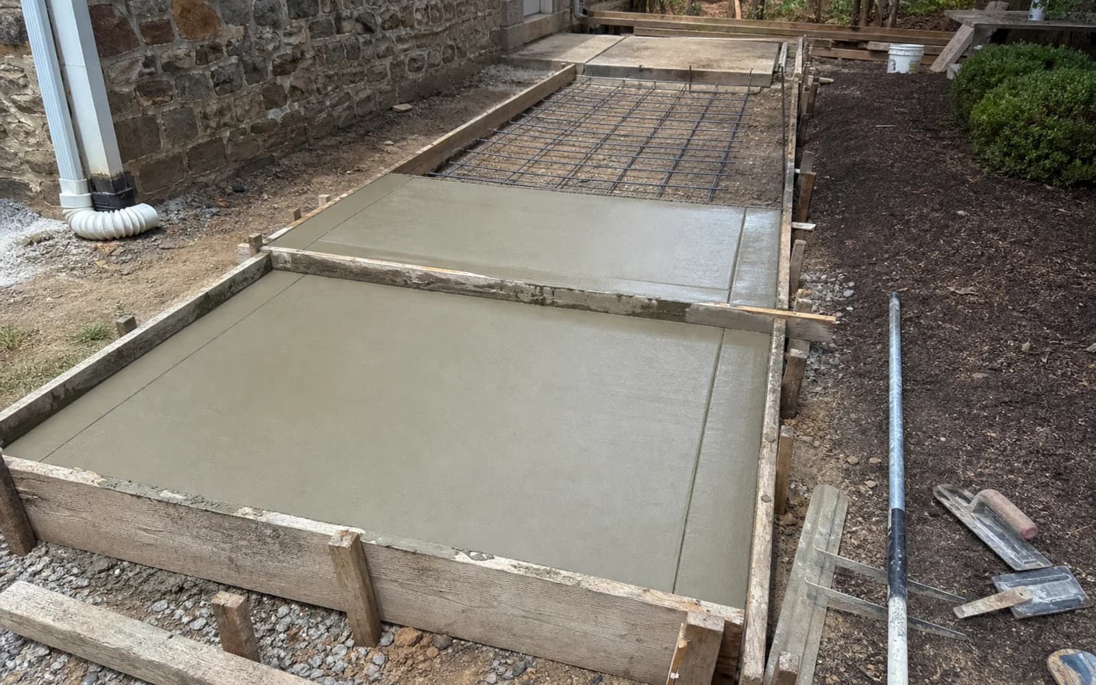 Custom forming, reinforcement, small pour, detail finishing, or concrete repair work in progress