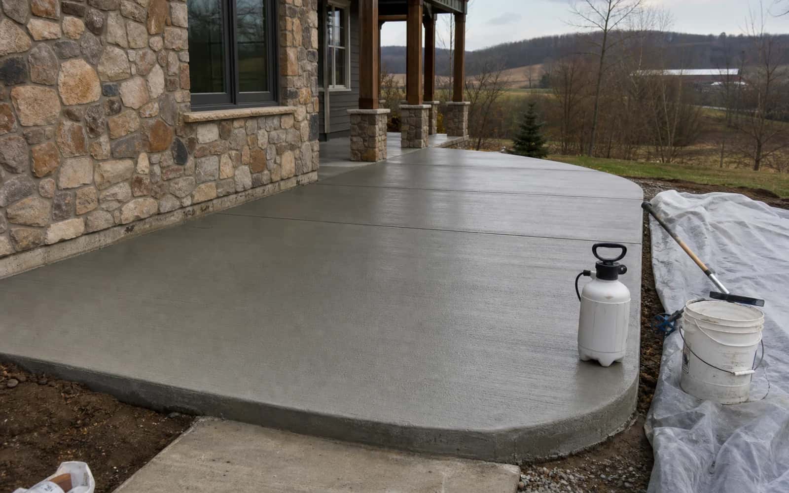 Finishing, cleanup, cure protection, final fit, and punch-list check for specialty concrete