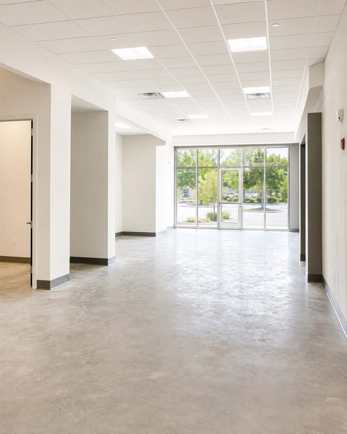 Lease-ready commercial interior with clean paint, lighting, flooring, and practical layout for occupancy